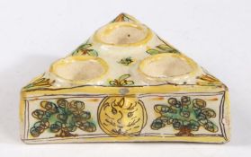 An 18th century Spanish faience triangular spice dish or condiment stand, Talavera Each side moulded