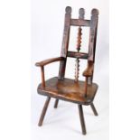 An interesting and good George III ash, sycamore and pine primitive chair, circa 1800 With traces