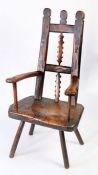 An interesting and good George III ash, sycamore and pine primitive chair, circa 1800 With traces