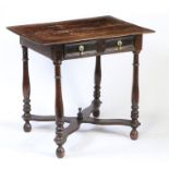A William & Mary oak side table, circa 1690 The top of two boards with ovolo-moulded edge, above a
