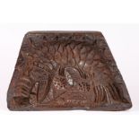 A rare and impressive early 17th century elm culinary mould, English Designed as a scaly fish,