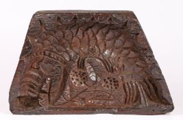 A rare and impressive early 17th century elm culinary mould, English Designed as a scaly fish,