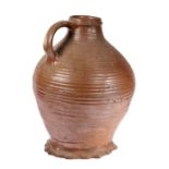 A large 16th century German medieval stoneware jug, circa 1500 - 1550 With a short neck body above a