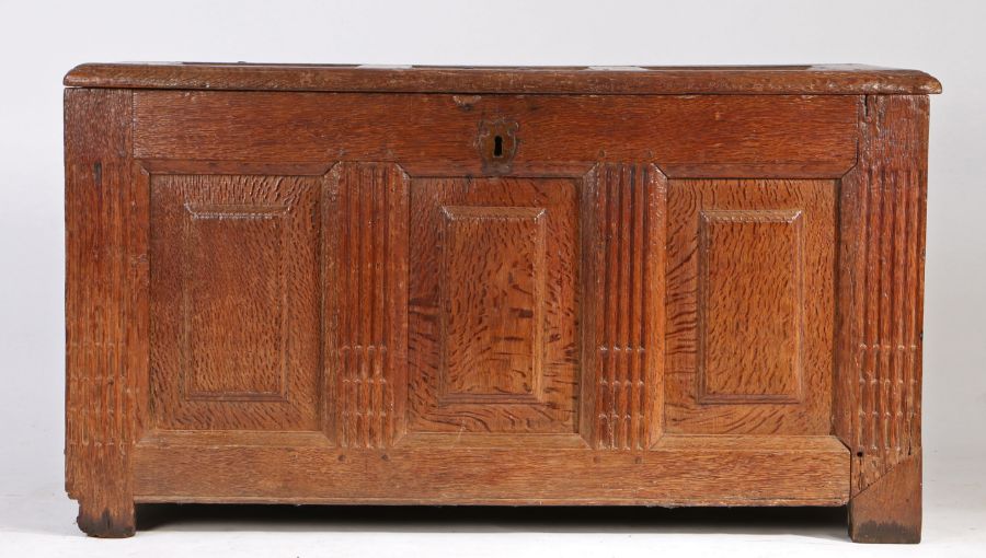 A 17th century oak coffer, German/Flemish The lid with three raised panels, and conforming front, - Image 5 of 6