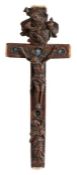 An 18th century reliquary crucifix The boxwood carved Christ on the cross with God above and St