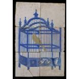 An 18th century Dutch Delft picture tile Designed in blue, with a caged yellow bird, 26cm x 40cm