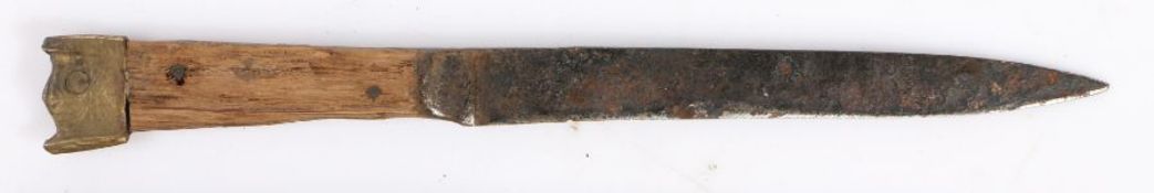A mid-15th century table knife, circa 1450, The fullered iron blade with a wooden handle and metal