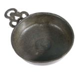 A rare early 17th century small pewter porringer, possibly for a child, English, circa 1635-50