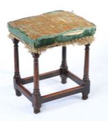 A 17th century walnut and upholstered stool, circa 1660 The stuff-over seat partly upholstered in