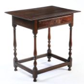 WITHDRAWN  A small oak side table, English, circa 1700 Having a thin boarded top, a well-figured