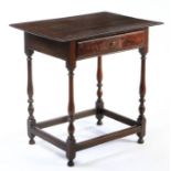 WITHDRAWN  A small oak side table, English, circa 1700 Having a thin boarded top, a well-figured