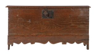 An Elizabeth I oak boarded chest, circa 1600 The moulded edges of the one-piece lid, together with