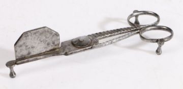 A pair of George III iron douters, circa 1770 Of scissor-form, both blades with upright