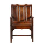 An interesting William & Mary oak triple-panelled 'loving' armchair, circa 1690  Of broad design,