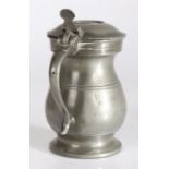 An imperial pewter half-pint dome-lidded bulbous measure, Glasgow, circa 1860 With two pairs of