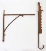 WITHDRAWN A 19th century adjustable iron pot-hook With serrated sixteen position shaft, adjusting on