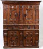 A 17th century oak livery cupboard, Franco-Flemish, circa 1650 and later Altered to form a full-
