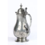 A small pewter coffee pot, possibly French, circa 1800 Of plain baluster form, tall double-domed lid