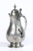 A small pewter coffee pot, possibly French, circa 1800 Of plain baluster form, tall double-domed lid