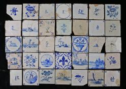 A collection of 18th century Dutch Delft tiles To include figural, landscape and floral examples, (