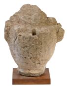 A carved stone urn or finial, probably Medieval, Northern France Raised on a square metal plinth,