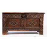 A James I/Charles I oak coffer, West Country, circa 1620-30 Having a twin-panelled hinged lid, the