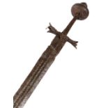A Medieval sword, late 13th/14th century, In excavated condition, the slender double edged blade