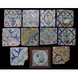 A collection of 18th century polychrome tiles To include foliate examples corner sections, and a
