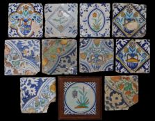 A collection of 18th century polychrome tiles To include foliate examples corner sections, and a