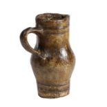 A rare papier maché jug Realistically modelled as a 15th century stoneware jug, height 15.5cm