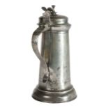A small Charles I pewter flagon, circa 1640 Having a tapering drum with paired incised lines above