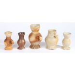 A collection of 16th & 17th century pottery To include jugs with flared lips and ribbed bodies,