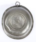 An early 18th century pewter wrigglework bowl, Dutch The outside designed with Tudor roses and