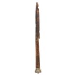 A 15th century table knife, English The fullered iron blade with wooden handle and a triple