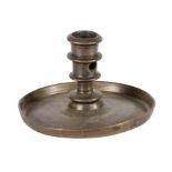 A 16th century bronze candlestick, circa 1500-50, possibly part Having a straight-sided and