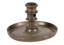 A 16th century bronze candlestick, circa 1500-50, possibly part Having a straight-sided and