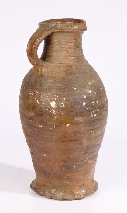 A 16th century German stoneware  jug, circa 1500 With a ribbed body and loop handle to the bulbous - Image 2 of 2