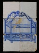 An 18th century Dutch Delft picture tile Designed in blue, with a caged yellow bird, 26cm x 39cm
