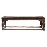 A Charles I oak refectory table, West Country, circa 1630 Having an end-cleated top formed from