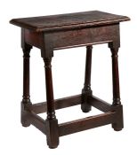 A William & Mary oak joint stool, circa 1690 The top with well-defined ovolo-moulded edge, plain