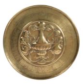 A brass alms dish type plaque, Nuremberg, probably 16th century Of slightly domed circular form,