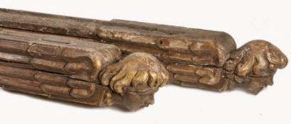 An impressive pair of oak and polychrome decorated angel hammer beams, circa 1650-1700, or
