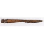 A 16th century table knife The fullered iron blade with pinned bone handle and iron pommel, 16.5cm