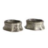 A pair of Queen Anne pewter octagonal trencher salts, circa 1710 Each of rectangular cut-corner