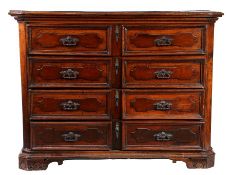 A solid walnut chest of drawers, Italian, circa 1700 Having an impressive one-piece top with
