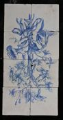 An 18th century Dutch Delft picture tile In blue, designed with a bouquet of flowers, 26cm x 52cm