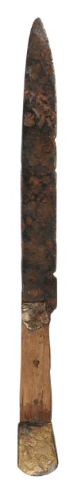 A mid-15th century table knife, circa 1450 The fullered iron blade with a wooden handle, and