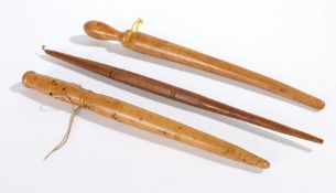 Three fruitwood lard 'skewers' Two of turned tapering form, one with baluster-shaped handle and