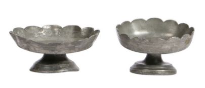 Two small early 18th century pewter footed strawberry dishes, circa 1720 Each of circular dish