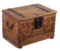 A boarded oak chest, possibly 15th century Of dove-tail construction, the top of two boards, and